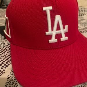 Red L.A hat with Mexico flag stitch on the side